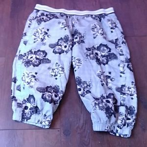 Gray and black shorts the knees